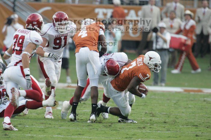 The University of Texas football team defeated the Arkansas Razorbacks with a score of 52-10 in Austin, TX on Saturday, September 27, 2008.

Filename: SRM_20080927_17300205.jpg
Aperture: f/5.6
Shutter Speed: 1/500
Body: Canon EOS-1D Mark II
Lens: Canon EF 300mm f/2.8 L IS