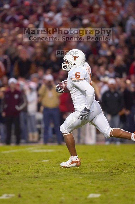 The University of Texas, Austin played Texas A&M in football at Kyle Field, College Station, on November 23, 2007.  UT lost to the Aggies, 30 to 38.

Filename: SRM_20071123_1821581.jpg
Aperture: f/2.8
Shutter Speed: 1/500
Body: Canon EOS-1D Mark II
Lens: Canon EF 300mm f/2.8 L IS