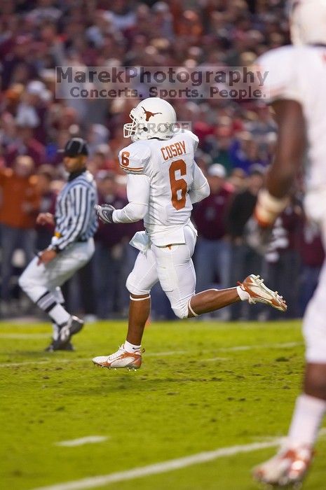 The University of Texas, Austin played Texas A&M in football at Kyle Field, College Station, on November 23, 2007.  UT lost to the Aggies, 30 to 38.

Filename: SRM_20071123_1822004.jpg
Aperture: f/2.8
Shutter Speed: 1/500
Body: Canon EOS-1D Mark II
Lens: Canon EF 300mm f/2.8 L IS