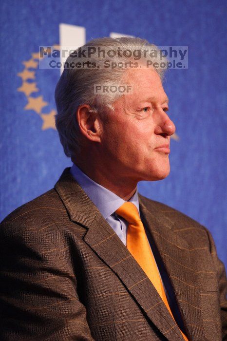 Former President Bill Clinton listens to UT President William Powers Jr. speak at the opening plenary session of the CGIU meeting.  Day one of the 2nd Annual Clinton Global Initiative University (CGIU) meeting was held at The University of Texas at Austin, Friday, February 13, 2009.

Filename: SRM_20090213_16303526.jpg
Aperture: f/2.8
Shutter Speed: 1/250
Body: Canon EOS 20D
Lens: Canon EF 300mm f/2.8 L IS