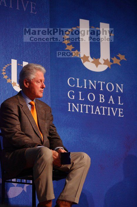 Former President Bill Clinton listens to UT President William Powers Jr. speak at the opening plenary session of the CGIU meeting.  Day one of the 2nd Annual Clinton Global Initiative University (CGIU) meeting was held at The University of Texas at Austin, Friday, February 13, 2009.

Filename: SRM_20090213_16332285.jpg
Aperture: f/4.0
Shutter Speed: 1/200
Body: Canon EOS-1D Mark II
Lens: Canon EF 80-200mm f/2.8 L