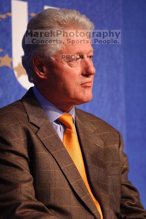 Former President Bill Clinton listens to UT President William Powers Jr. speak at the opening plenary session of the CGIU meeting.  Day one of the 2nd Annual Clinton Global Initiative University (CGIU) meeting was held at The University of Texas at Austin, Friday, February 13, 2009.

Filename: SRM_20090213_16344752.jpg
Aperture: f/2.8
Shutter Speed: 1/250
Body: Canon EOS 20D
Lens: Canon EF 300mm f/2.8 L IS