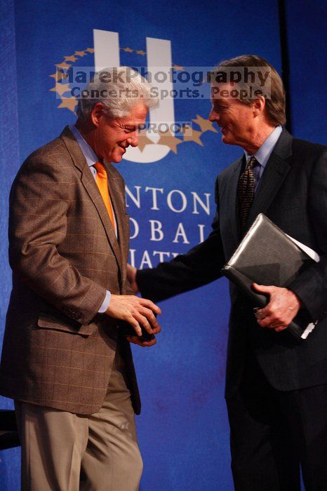 Former President Bill Clinton shakes hands with UT President William Powers Jr. after he spoke at the opening plenary session of the CGIU meeting.  Day one of the 2nd Annual Clinton Global Initiative University (CGIU) meeting was held at The University of Texas at Austin, Friday, February 13, 2009.

Filename: SRM_20090213_16354313.jpg
Aperture: f/4.0
Shutter Speed: 1/160
Body: Canon EOS-1D Mark II
Lens: Canon EF 80-200mm f/2.8 L