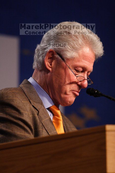 Former President Bill Clinton hands out commitment certificates to CGIU attendees for their exceptional pledges to the CGI cause during the opening plenary session of the CGIU meeting.  Day one of the 2nd Annual Clinton Global Initiative University (CGIU) meeting was held at The University of Texas at Austin, Friday, February 13, 2009.

Filename: SRM_20090213_16363962.jpg
Aperture: f/2.8
Shutter Speed: 1/250
Body: Canon EOS 20D
Lens: Canon EF 300mm f/2.8 L IS