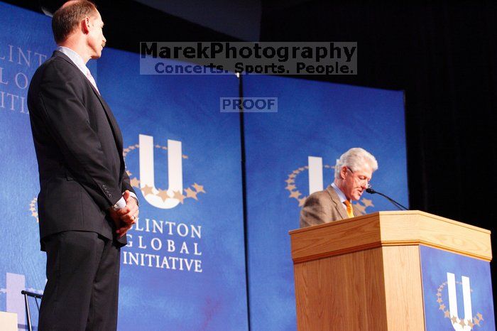 Former President Bill Clinton hands out commitment certificates to CGIU attendees for their exceptional pledges to the CGI cause during the opening plenary session of the CGIU meeting.  Day one of the 2nd Annual Clinton Global Initiative University (CGIU) meeting was held at The University of Texas at Austin, Friday, February 13, 2009.

Filename: SRM_20090213_16373419.jpg
Aperture: f/4.0
Shutter Speed: 1/80
Body: Canon EOS-1D Mark II
Lens: Canon EF 80-200mm f/2.8 L