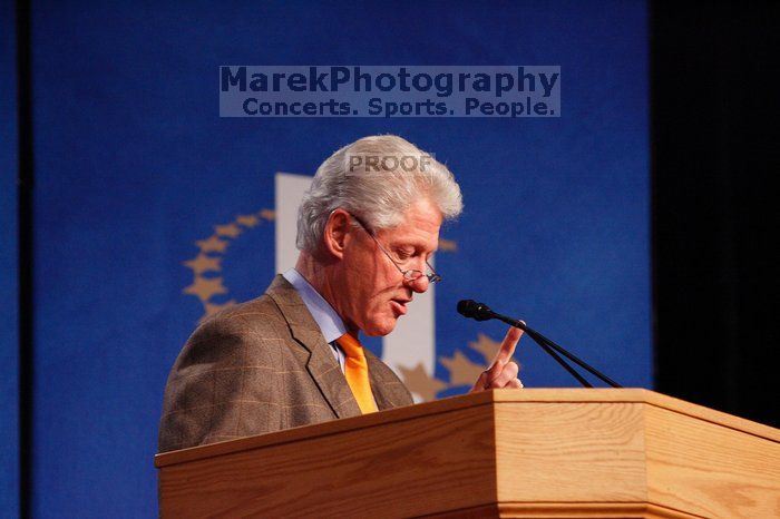 Former President Bill Clinton hands out commitment certificates to CGIU attendees for their exceptional pledges to the CGI cause during the opening plenary session of the CGIU meeting.  Day one of the 2nd Annual Clinton Global Initiative University (CGIU) meeting was held at The University of Texas at Austin, Friday, February 13, 2009.

Filename: SRM_20090213_16385427.jpg
Aperture: f/4.0
Shutter Speed: 1/160
Body: Canon EOS-1D Mark II
Lens: Canon EF 80-200mm f/2.8 L