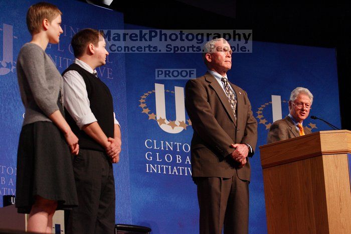 Former President Bill Clinton hands out commitment certificates to CGIU attendees for their exceptional pledges to the CGI cause during the opening plenary session of the CGIU meeting.  Day one of the 2nd Annual Clinton Global Initiative University (CGIU) meeting was held at The University of Texas at Austin, Friday, February 13, 2009.

Filename: SRM_20090213_16501868.jpg
Aperture: f/4.0
Shutter Speed: 1/160
Body: Canon EOS-1D Mark II
Lens: Canon EF 80-200mm f/2.8 L