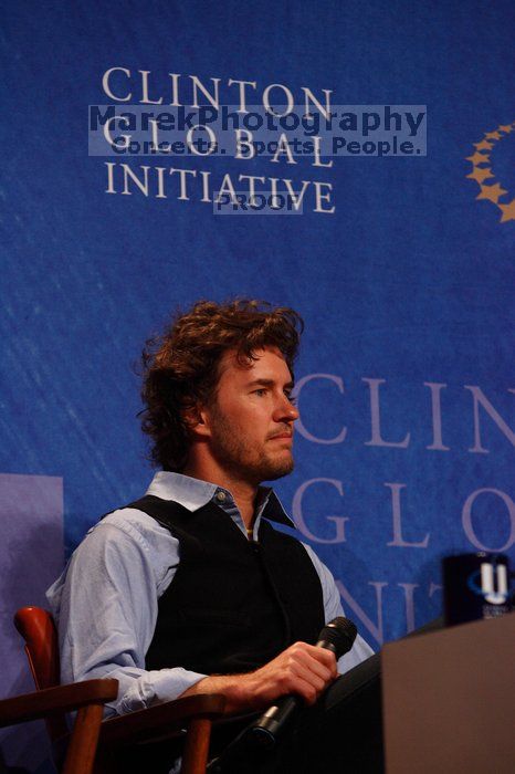 Blake Mycoskie, founder of TOMS shoes, donates one pair of shoes to a third world country for every pair of shoes they sell.  Day one of the 2nd Annual Clinton Global Initiative University (CGIU) meeting was held at The University of Texas at Austin, Friday, February 13, 2009.

Filename: SRM_20090213_16543328.jpg
Aperture: f/4.0
Shutter Speed: 1/250
Body: Canon EOS-1D Mark II
Lens: Canon EF 80-200mm f/2.8 L