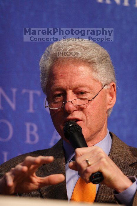 Former President Bill Clinton moderated the discussion between Natalie Portman, Mambidzeni Madzivire, BME graduate student at Mayo Graduate School, Blake Mycoskie, founder of TOMS shoes, and Paul Bell, president of Dell Global Public, during the first plenary session at the CGIU meeting.  Day one of the 2nd Annual Clinton Global Initiative University (CGIU) meeting was held at The University of Texas at Austin, Friday, February 13, 2009.

Filename: SRM_20090213_16573265.jpg
Aperture: f/3.2
Shutter Speed: 1/400
Body: Canon EOS 20D
Lens: Canon EF 300mm f/2.8 L IS