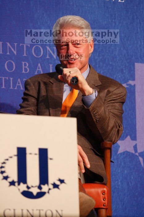 Former President Bill Clinton moderated the discussion between Natalie Portman, Mambidzeni Madzivire, BME graduate student at Mayo Graduate School, Blake Mycoskie, founder of TOMS shoes, and Paul Bell, president of Dell Global Public, during the first plenary session at the CGIU meeting.  Day one of the 2nd Annual Clinton Global Initiative University (CGIU) meeting was held at The University of Texas at Austin, Friday, February 13, 2009.

Filename: SRM_20090213_16590958.jpg
Aperture: f/4.5
Shutter Speed: 1/200
Body: Canon EOS-1D Mark II
Lens: Canon EF 80-200mm f/2.8 L