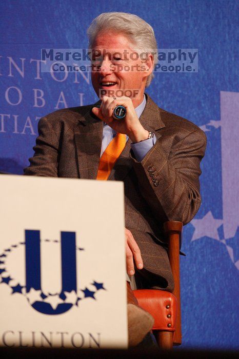 Former President Bill Clinton moderated the discussion between Natalie Portman, Mambidzeni Madzivire, BME graduate student at Mayo Graduate School, Blake Mycoskie, founder of TOMS shoes, and Paul Bell, president of Dell Global Public, during the first plenary session at the CGIU meeting.  Day one of the 2nd Annual Clinton Global Initiative University (CGIU) meeting was held at The University of Texas at Austin, Friday, February 13, 2009.

Filename: SRM_20090213_16591161.jpg
Aperture: f/4.5
Shutter Speed: 1/200
Body: Canon EOS-1D Mark II
Lens: Canon EF 80-200mm f/2.8 L