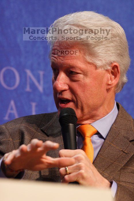 Former President Bill Clinton moderated the discussion between Natalie Portman, Mambidzeni Madzivire, BME graduate student at Mayo Graduate School, Blake Mycoskie, founder of TOMS shoes, and Paul Bell, president of Dell Global Public, during the first plenary session at the CGIU meeting.  Day one of the 2nd Annual Clinton Global Initiative University (CGIU) meeting was held at The University of Texas at Austin, Friday, February 13, 2009.

Filename: SRM_20090213_17003394.jpg
Aperture: f/4.0
Shutter Speed: 1/200
Body: Canon EOS 20D
Lens: Canon EF 300mm f/2.8 L IS