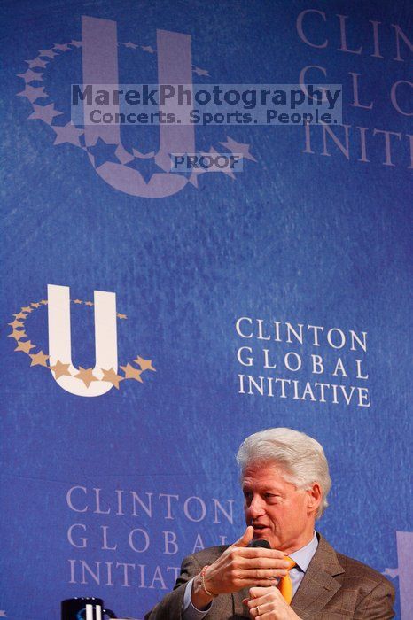 Former President Bill Clinton moderated the discussion between Natalie Portman, Mambidzeni Madzivire, BME graduate student at Mayo Graduate School, Blake Mycoskie, founder of TOMS shoes, and Paul Bell, president of Dell Global Public, during the first plenary session at the CGIU meeting.  Day one of the 2nd Annual Clinton Global Initiative University (CGIU) meeting was held at The University of Texas at Austin, Friday, February 13, 2009.

Filename: SRM_20090213_17010262.jpg
Aperture: f/4.5
Shutter Speed: 1/160
Body: Canon EOS-1D Mark II
Lens: Canon EF 80-200mm f/2.8 L