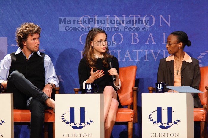 Blake Mycoskie (L), founder of TOMS shoes, Natalie Portman (C), and Mambidzeni Madzivire (R), BME graduate student at Mayo Graduate School, at the first plenary session of the CGIU meeting.  Day one of the 2nd Annual Clinton Global Initiative University (CGIU) meeting was held at The University of Texas at Austin, Friday, February 13, 2009.

Filename: SRM_20090213_17040216.jpg
Aperture: f/4.0
Shutter Speed: 1/200
Body: Canon EOS 20D
Lens: Canon EF 300mm f/2.8 L IS