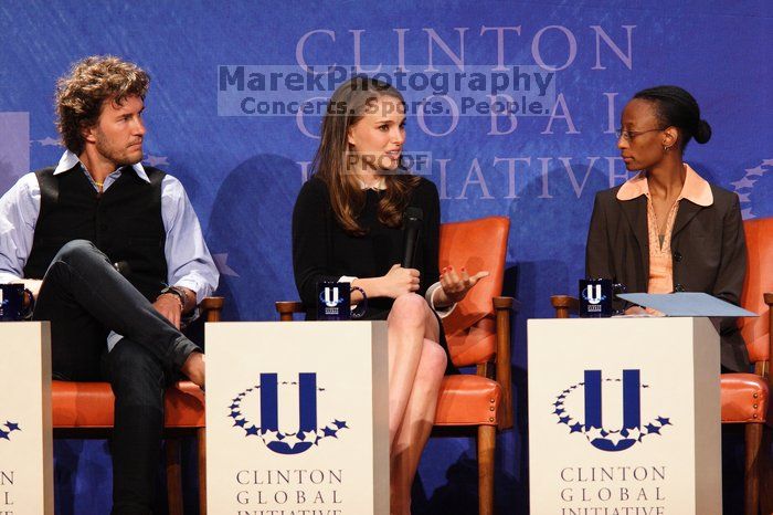 Blake Mycoskie (L), founder of TOMS shoes, Natalie Portman (C), and Mambidzeni Madzivire (R), BME graduate student at Mayo Graduate School, at the first plenary session of the CGIU meeting.  Day one of the 2nd Annual Clinton Global Initiative University (CGIU) meeting was held at The University of Texas at Austin, Friday, February 13, 2009.

Filename: SRM_20090213_17062645.jpg
Aperture: f/4.0
Shutter Speed: 1/200
Body: Canon EOS 20D
Lens: Canon EF 300mm f/2.8 L IS