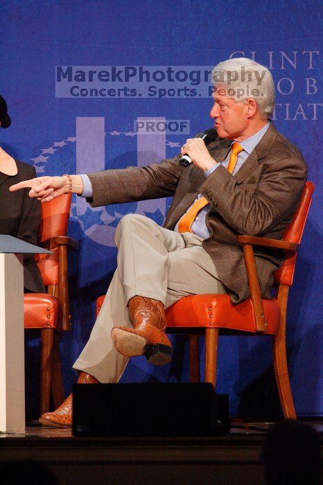 Former President Bill Clinton moderated the discussion between Natalie Portman, Mambidzeni Madzivire, BME graduate student at Mayo Graduate School, Blake Mycoskie, founder of TOMS shoes, and Paul Bell, president of Dell Global Public, during the first plenary session at the CGIU meeting.  Day one of the 2nd Annual Clinton Global Initiative University (CGIU) meeting was held at The University of Texas at Austin, Friday, February 13, 2009.

Filename: SRM_20090213_17150199.jpg
Aperture: f/5.6
Shutter Speed: 1/200
Body: Canon EOS-1D Mark II
Lens: Canon EF 300mm f/2.8 L IS