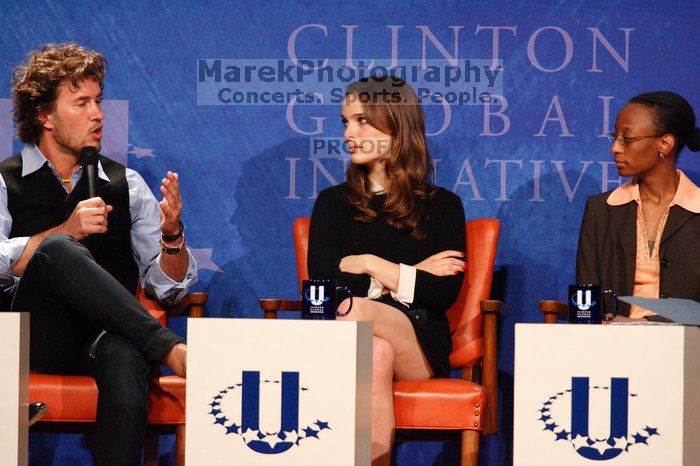 Blake Mycoskie (L), founder of TOMS shoes, Natalie Portman (C), and Mambidzeni Madzivire (R), BME graduate student at Mayo Graduate School, at the first plenary session of the CGIU meeting.  Day one of the 2nd Annual Clinton Global Initiative University (CGIU) meeting was held at The University of Texas at Austin, Friday, February 13, 2009.

Filename: SRM_20090213_17152803.jpg
Aperture: f/5.6
Shutter Speed: 1/200
Body: Canon EOS-1D Mark II
Lens: Canon EF 300mm f/2.8 L IS