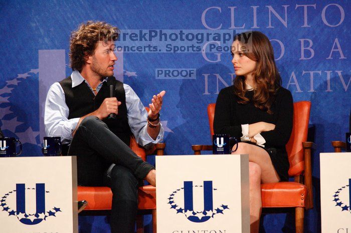 Blake Mycoskie (L), founder of TOMS shoes, and Natalie Portman (R) at the first plenary session of the CGIU meeting.  Day one of the 2nd Annual Clinton Global Initiative University (CGIU) meeting was held at The University of Texas at Austin, Friday, February 13, 2009.

Filename: SRM_20090213_17161705.jpg
Aperture: f/5.6
Shutter Speed: 1/200
Body: Canon EOS-1D Mark II
Lens: Canon EF 300mm f/2.8 L IS