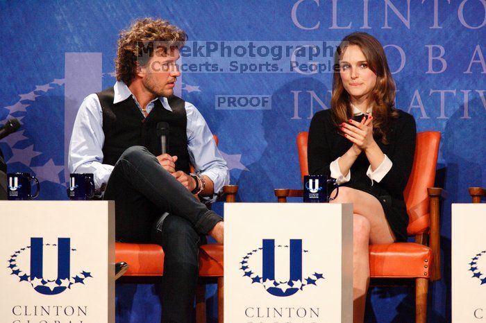 Blake Mycoskie (L), founder of TOMS shoes, and Natalie Portman (R) at the first plenary session of the CGIU meeting.  Day one of the 2nd Annual Clinton Global Initiative University (CGIU) meeting was held at The University of Texas at Austin, Friday, February 13, 2009.

Filename: SRM_20090213_17163814.jpg
Aperture: f/5.6
Shutter Speed: 1/200
Body: Canon EOS-1D Mark II
Lens: Canon EF 300mm f/2.8 L IS