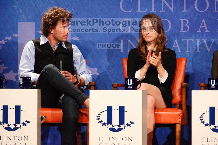 Blake Mycoskie (L), founder of TOMS shoes, and Natalie Portman (R) at the first plenary session of the CGIU meeting.  Day one of the 2nd Annual Clinton Global Initiative University (CGIU) meeting was held at The University of Texas at Austin, Friday, February 13, 2009.

Filename: SRM_20090213_17163915.jpg
Aperture: f/5.6
Shutter Speed: 1/200
Body: Canon EOS-1D Mark II
Lens: Canon EF 300mm f/2.8 L IS