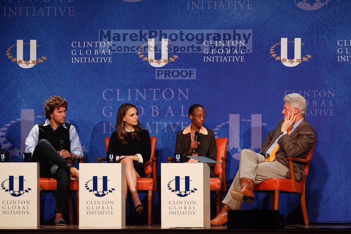 Blake Mycoskie (1-L), founder of TOMS shoes, Natalie Portman (2-L), Mambidzeni Madzivire (2-R), BME graduate student at Mayo Graduate School, and Former President Bill Clinton (1-R) at the first plenary session of the CGIU meeting.  Day one of the 2nd Annual Clinton Global Initiative University (CGIU) meeting was held at The University of Texas at Austin, Friday, February 13, 2009.

Filename: SRM_20090213_17290344.jpg
Aperture: f/4.0
Shutter Speed: 1/400
Body: Canon EOS-1D Mark II
Lens: Canon EF 300mm f/2.8 L IS