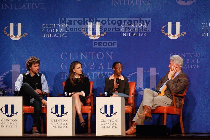 Blake Mycoskie (1-L), founder of TOMS shoes, Natalie Portman (2-L), Mambidzeni Madzivire (2-R), BME graduate student at Mayo Graduate School, and Former President Bill Clinton (1-R) at the first plenary session of the CGIU meeting.  Day one of the 2nd Annual Clinton Global Initiative University (CGIU) meeting was held at The University of Texas at Austin, Friday, February 13, 2009.

Filename: SRM_20090213_17290345.jpg
Aperture: f/4.0
Shutter Speed: 1/400
Body: Canon EOS-1D Mark II
Lens: Canon EF 300mm f/2.8 L IS