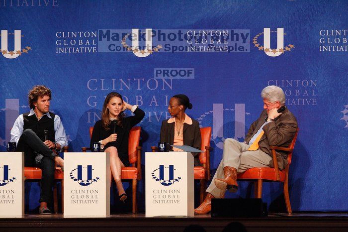 Blake Mycoskie (1-L), founder of TOMS shoes, Natalie Portman (2-L), Mambidzeni Madzivire (2-R), BME graduate student at Mayo Graduate School, and Former President Bill Clinton (1-R) at the first plenary session of the CGIU meeting.  Day one of the 2nd Annual Clinton Global Initiative University (CGIU) meeting was held at The University of Texas at Austin, Friday, February 13, 2009.

Filename: SRM_20090213_17293960.jpg
Aperture: f/5.0
Shutter Speed: 1/250
Body: Canon EOS-1D Mark II
Lens: Canon EF 300mm f/2.8 L IS