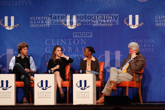 Blake Mycoskie (1-L), founder of TOMS shoes, Natalie Portman (2-L), Mambidzeni Madzivire (2-R), BME graduate student at Mayo Graduate School, and Former President Bill Clinton (1-R) at the first plenary session of the CGIU meeting.  Day one of the 2nd Annual Clinton Global Initiative University (CGIU) meeting was held at The University of Texas at Austin, Friday, February 13, 2009.

Filename: SRM_20090213_17294063.jpg
Aperture: f/5.0
Shutter Speed: 1/250
Body: Canon EOS-1D Mark II
Lens: Canon EF 300mm f/2.8 L IS