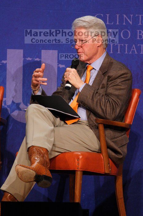 Former President Bill Clinton moderated the discussion between Natalie Portman, Mambidzeni Madzivire, BME graduate student at Mayo Graduate School, Blake Mycoskie, founder of TOMS shoes, and Paul Bell, president of Dell Global Public, during the first plenary session at the CGIU meeting.  Day one of the 2nd Annual Clinton Global Initiative University (CGIU) meeting was held at The University of Texas at Austin, Friday, February 13, 2009.

Filename: SRM_20090213_17361415.jpg
Aperture: f/5.6
Shutter Speed: 1/250
Body: Canon EOS 20D
Lens: Canon EF 300mm f/2.8 L IS