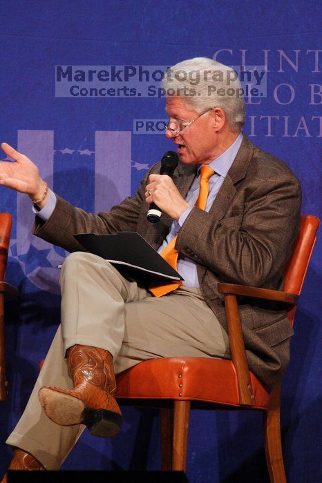 Former President Bill Clinton moderated the discussion between Natalie Portman, Mambidzeni Madzivire, BME graduate student at Mayo Graduate School, Blake Mycoskie, founder of TOMS shoes, and Paul Bell, president of Dell Global Public, during the first plenary session at the CGIU meeting.  Day one of the 2nd Annual Clinton Global Initiative University (CGIU) meeting was held at The University of Texas at Austin, Friday, February 13, 2009.

Filename: SRM_20090213_17362219.jpg
Aperture: f/5.6
Shutter Speed: 1/250
Body: Canon EOS 20D
Lens: Canon EF 300mm f/2.8 L IS