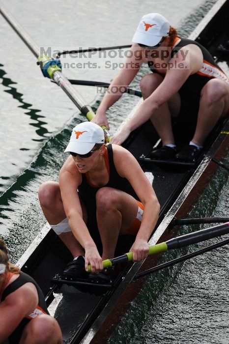 The Texas Rowing first varsity eight team, with coxswain Mary Cait McPherson, stroke Jen VanderMaarel, Felicia Izaguirre-Werner, Meg George, Nancy Arrington, Jelena Zunic, Karli Sheahan, Colleen Irby and Sara Cottingham, finished with a time of 6:44.7, defeating Duke which completed the race in 6:49.9. This was the second session of the Longhorn Invitational, Saturday morning, March 21, 2009 on Lady Bird Lake.  They later won one more race against UCF on Sunday.

Filename: SRM_20090321_08402470.jpg
Aperture: f/2.8
Shutter Speed: 1/2000
Body: Canon EOS-1D Mark II
Lens: Canon EF 300mm f/2.8 L IS