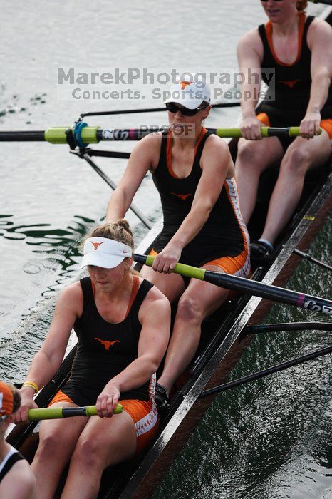 The Texas Rowing first varsity eight team, with coxswain Mary Cait McPherson, stroke Jen VanderMaarel, Felicia Izaguirre-Werner, Meg George, Nancy Arrington, Jelena Zunic, Karli Sheahan, Colleen Irby and Sara Cottingham, finished with a time of 6:44.7, defeating Duke which completed the race in 6:49.9. This was the second session of the Longhorn Invitational, Saturday morning, March 21, 2009 on Lady Bird Lake.  They later won one more race against UCF on Sunday.

Filename: SRM_20090321_08402573.jpg
Aperture: f/2.8
Shutter Speed: 1/2000
Body: Canon EOS-1D Mark II
Lens: Canon EF 300mm f/2.8 L IS