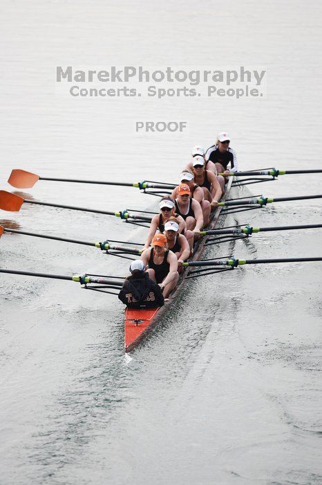 The Texas Rowing first varsity eight team, with coxswain Mary Cait McPherson, stroke Jen VanderMaarel, Felicia Izaguirre-Werner, Meg George, Nancy Arrington, Jelena Zunic, Karli Sheahan, Colleen Irby and Sara Cottingham, finished with a time of 6:44.7, defeating Duke which completed the race in 6:49.9. This was the second session of the Longhorn Invitational, Saturday morning, March 21, 2009 on Lady Bird Lake.  They later won one more race against UCF on Sunday.

Filename: SRM_20090321_08403483.jpg
Aperture: f/2.8
Shutter Speed: 1/2000
Body: Canon EOS-1D Mark II
Lens: Canon EF 300mm f/2.8 L IS