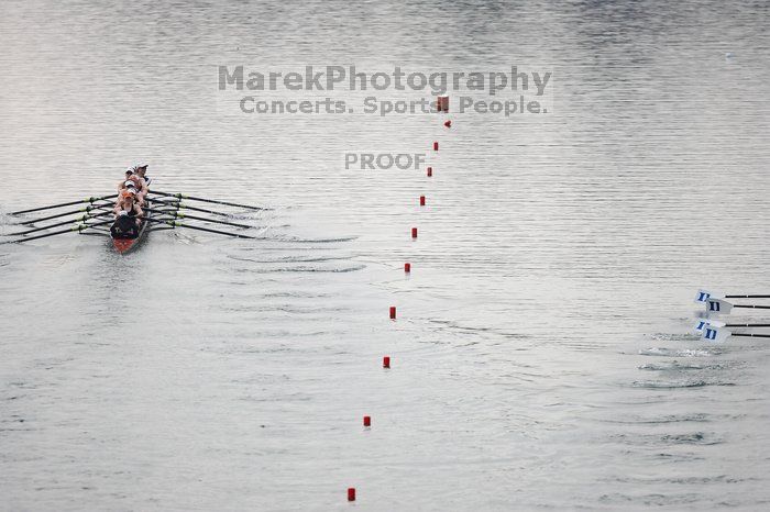 The Texas Rowing first varsity eight team, with coxswain Mary Cait McPherson, stroke Jen VanderMaarel, Felicia Izaguirre-Werner, Meg George, Nancy Arrington, Jelena Zunic, Karli Sheahan, Colleen Irby and Sara Cottingham, finished with a time of 6:44.7, defeating Duke which completed the race in 6:49.9. This was the second session of the Longhorn Invitational, Saturday morning, March 21, 2009 on Lady Bird Lake.  They later won one more race against UCF on Sunday.

Filename: SRM_20090321_08405191.jpg
Aperture: f/2.8
Shutter Speed: 1/3200
Body: Canon EOS-1D Mark II
Lens: Canon EF 300mm f/2.8 L IS