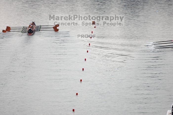 The Texas Rowing first varsity eight team, with coxswain Mary Cait McPherson, stroke Jen VanderMaarel, Felicia Izaguirre-Werner, Meg George, Nancy Arrington, Jelena Zunic, Karli Sheahan, Colleen Irby and Sara Cottingham, finished with a time of 6:44.7, defeating Duke which completed the race in 6:49.9. This was the second session of the Longhorn Invitational, Saturday morning, March 21, 2009 on Lady Bird Lake.  They later won one more race against UCF on Sunday.

Filename: SRM_20090321_08405794.jpg
Aperture: f/2.8
Shutter Speed: 1/3200
Body: Canon EOS-1D Mark II
Lens: Canon EF 300mm f/2.8 L IS