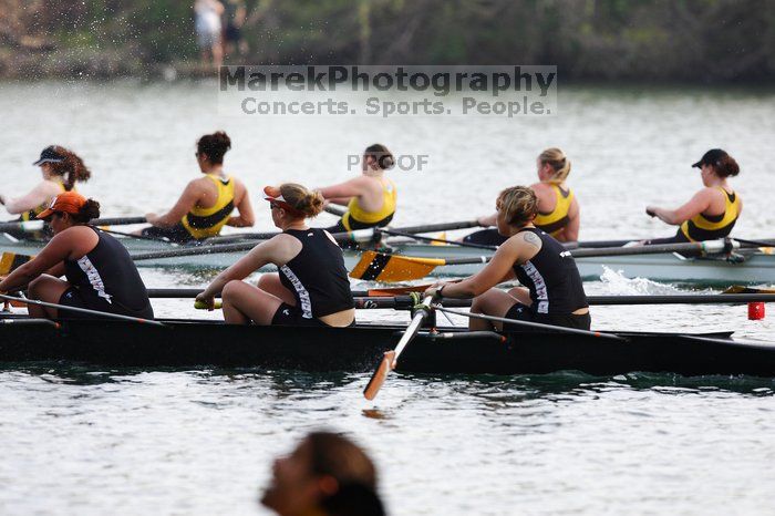 The Texas Rowing second novice eight team, with coxswain Emma Dirks, Sharon Dietz, Lucia Babar, Kait Postle, Ashley Hiatt, Andrea Janowski, Madonna Bregon, Daryn Ofczarzak and Dani Mohling, finished with a time of 7:34.5, defeating Iowa which completed the race in 7:35.6. This was the second session of the Longhorn Invitational, Saturday morning, March 21, 2009 on Lady Bird Lake.  They won a total of three races over the weekend.

Filename: SRM_20090321_09350944.jpg
Aperture: f/4.0
Shutter Speed: 1/1250
Body: Canon EOS-1D Mark II
Lens: Canon EF 300mm f/2.8 L IS