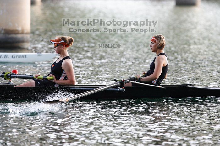 The Texas Rowing second novice eight team, with coxswain Emma Dirks, Sharon Dietz, Lucia Babar, Kait Postle, Ashley Hiatt, Andrea Janowski, Madonna Bregon, Daryn Ofczarzak and Dani Mohling, finished with a time of 7:34.5, defeating Iowa which completed the race in 7:35.6. This was the second session of the Longhorn Invitational, Saturday morning, March 21, 2009 on Lady Bird Lake.  They won a total of three races over the weekend.

Filename: SRM_20090321_09351551.jpg
Aperture: f/4.0
Shutter Speed: 1/1250
Body: Canon EOS-1D Mark II
Lens: Canon EF 300mm f/2.8 L IS