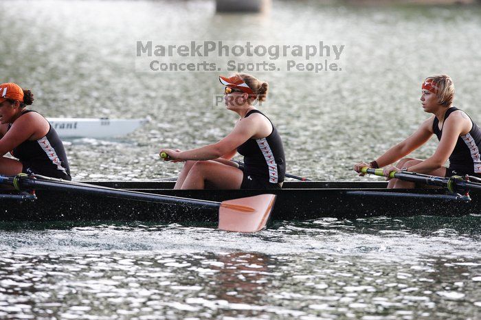 The Texas Rowing second novice eight team, with coxswain Emma Dirks, Sharon Dietz, Lucia Babar, Kait Postle, Ashley Hiatt, Andrea Janowski, Madonna Bregon, Daryn Ofczarzak and Dani Mohling, finished with a time of 7:34.5, defeating Iowa which completed the race in 7:35.6. This was the second session of the Longhorn Invitational, Saturday morning, March 21, 2009 on Lady Bird Lake.  They won a total of three races over the weekend.

Filename: SRM_20090321_09351653.jpg
Aperture: f/4.0
Shutter Speed: 1/1250
Body: Canon EOS-1D Mark II
Lens: Canon EF 300mm f/2.8 L IS