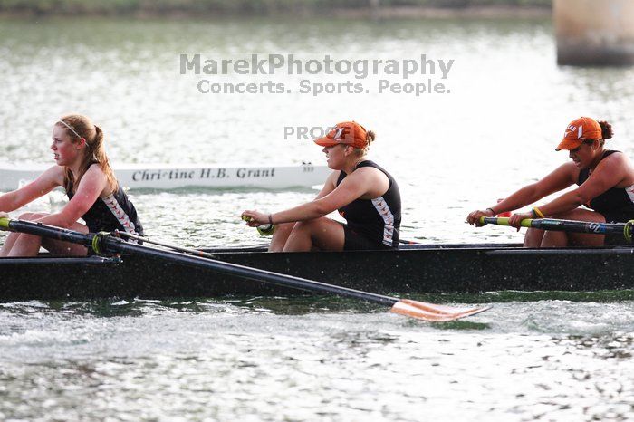 The Texas Rowing second novice eight team, with coxswain Emma Dirks, Sharon Dietz, Lucia Babar, Kait Postle, Ashley Hiatt, Andrea Janowski, Madonna Bregon, Daryn Ofczarzak and Dani Mohling, finished with a time of 7:34.5, defeating Iowa which completed the race in 7:35.6. This was the second session of the Longhorn Invitational, Saturday morning, March 21, 2009 on Lady Bird Lake.  They won a total of three races over the weekend.

Filename: SRM_20090321_09351862.jpg
Aperture: f/4.0
Shutter Speed: 1/1250
Body: Canon EOS-1D Mark II
Lens: Canon EF 300mm f/2.8 L IS