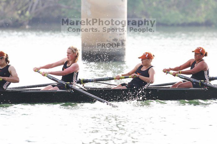 The Texas Rowing second novice eight team, with coxswain Emma Dirks, Sharon Dietz, Lucia Babar, Kait Postle, Ashley Hiatt, Andrea Janowski, Madonna Bregon, Daryn Ofczarzak and Dani Mohling, finished with a time of 7:34.5, defeating Iowa which completed the race in 7:35.6. This was the second session of the Longhorn Invitational, Saturday morning, March 21, 2009 on Lady Bird Lake.  They won a total of three races over the weekend.

Filename: SRM_20090321_09352065.jpg
Aperture: f/4.0
Shutter Speed: 1/1250
Body: Canon EOS-1D Mark II
Lens: Canon EF 300mm f/2.8 L IS