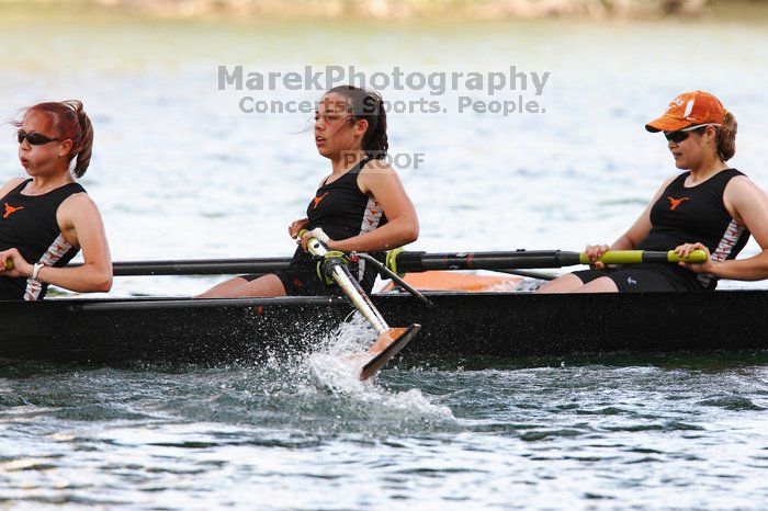 The Texas Rowing second novice eight team, with coxswain Emma Dirks, Sharon Dietz, Lucia Babar, Kait Postle, Ashley Hiatt, Andrea Janowski, Madonna Bregon, Daryn Ofczarzak and Dani Mohling, finished with a time of 8:07.5, losing to Wisconsin, which completed the race in 7:47.1. This was the third session of the Longhorn Invitational, Saturday afternoon, March 21, 2009 on Lady Bird Lake.  They won a total of three races over the weekend.

Filename: SRM_20090321_16014717.jpg
Aperture: f/5.6
Shutter Speed: 1/1000
Body: Canon EOS-1D Mark II
Lens: Canon EF 300mm f/2.8 L IS