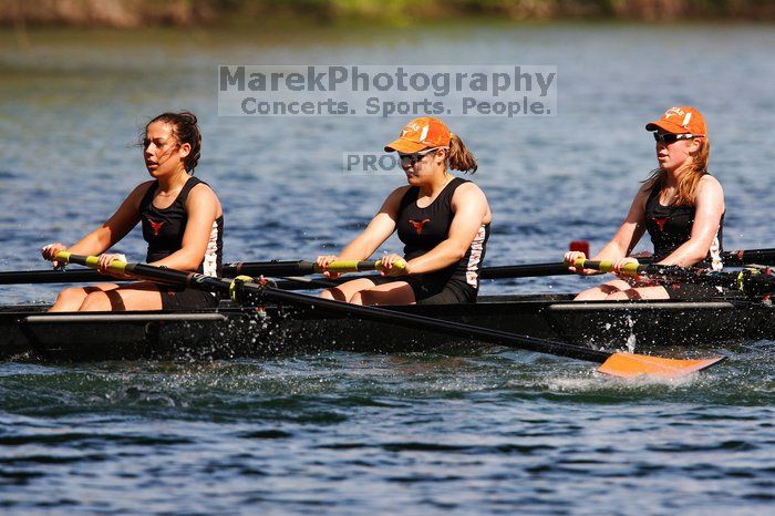 The Texas Rowing second novice eight team, with coxswain Emma Dirks, Sharon Dietz, Lucia Babar, Kait Postle, Ashley Hiatt, Andrea Janowski, Madonna Bregon, Daryn Ofczarzak and Dani Mohling, finished with a time of 8:07.5, losing to Wisconsin, which completed the race in 7:47.1. This was the third session of the Longhorn Invitational, Saturday afternoon, March 21, 2009 on Lady Bird Lake.  They won a total of three races over the weekend.

Filename: SRM_20090321_16014918.jpg
Aperture: f/5.6
Shutter Speed: 1/2000
Body: Canon EOS-1D Mark II
Lens: Canon EF 300mm f/2.8 L IS