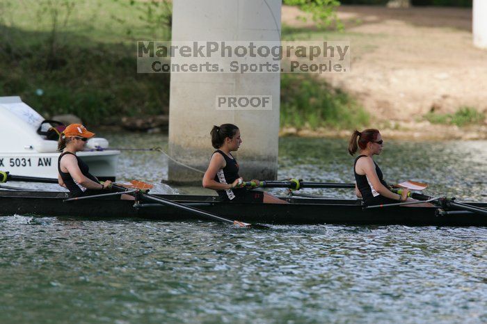 The Texas Rowing second novice eight team, with coxswain Emma Dirks, Sharon Dietz, Lucia Babar, Kait Postle, Ashley Hiatt, Andrea Janowski, Madonna Bregon, Daryn Ofczarzak and Dani Mohling, finished with a time of 8:07.5, losing to Wisconsin, which completed the race in 7:47.1. This was the third session of the Longhorn Invitational, Saturday afternoon, March 21, 2009 on Lady Bird Lake.  They won a total of three races over the weekend.

Filename: SRM_20090321_16063821.jpg
Aperture: f/5.6
Shutter Speed: 1/800
Body: Canon EOS-1D Mark II
Lens: Canon EF 300mm f/2.8 L IS