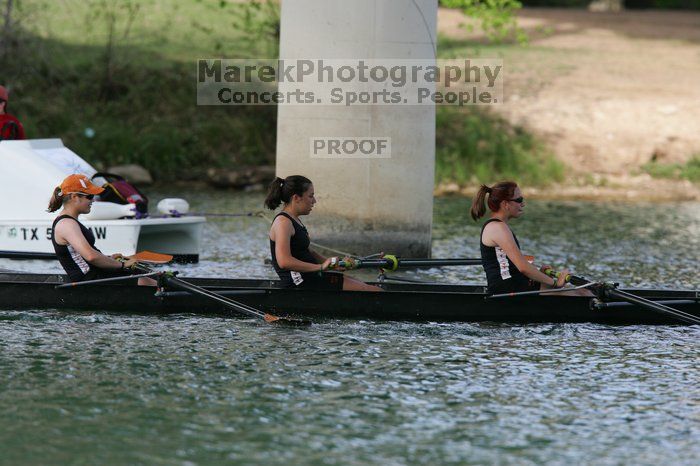 The Texas Rowing second novice eight team, with coxswain Emma Dirks, Sharon Dietz, Lucia Babar, Kait Postle, Ashley Hiatt, Andrea Janowski, Madonna Bregon, Daryn Ofczarzak and Dani Mohling, finished with a time of 8:07.5, losing to Wisconsin, which completed the race in 7:47.1. This was the third session of the Longhorn Invitational, Saturday afternoon, March 21, 2009 on Lady Bird Lake.  They won a total of three races over the weekend.

Filename: SRM_20090321_16063822.jpg
Aperture: f/5.6
Shutter Speed: 1/800
Body: Canon EOS-1D Mark II
Lens: Canon EF 300mm f/2.8 L IS