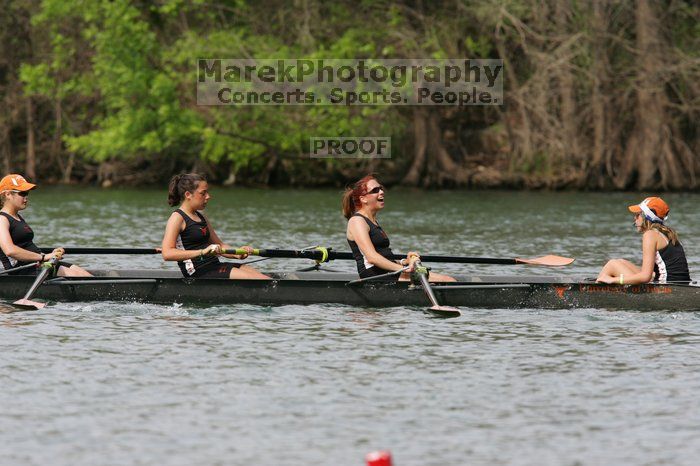 The Texas Rowing second novice eight team, with coxswain Emma Dirks, Sharon Dietz, Lucia Babar, Kait Postle, Ashley Hiatt, Andrea Janowski, Madonna Bregon, Daryn Ofczarzak and Dani Mohling, finished with a time of 8:07.5, losing to Wisconsin, which completed the race in 7:47.1. This was the third session of the Longhorn Invitational, Saturday afternoon, March 21, 2009 on Lady Bird Lake.  They won a total of three races over the weekend.

Filename: SRM_20090321_16064523.jpg
Aperture: f/5.6
Shutter Speed: 1/1250
Body: Canon EOS-1D Mark II
Lens: Canon EF 300mm f/2.8 L IS