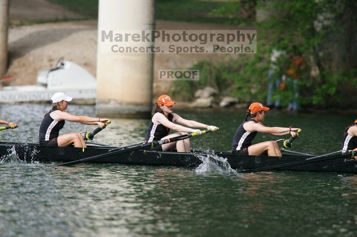 The Texas Rowing first novice eight team finished with a time of 7:51.3, losing to Wisconsin, which completed the race in 7:39.4. This was the third session of the Longhorn Invitational, Saturday afternoon, March 21, 2009 on Lady Bird Lake.

Filename: SRM_20090321_16164660.jpg
Aperture: f/4.0
Shutter Speed: 1/1600
Body: Canon EOS-1D Mark II
Lens: Canon EF 300mm f/2.8 L IS