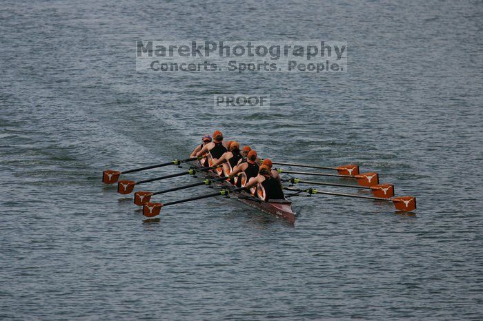 The Texas Rowing second varsity eight team finished with a time of 7:29.5, losing to Wisconsin, which completed the race in 7:15.5. This was the third session of the Longhorn Invitational, Saturday afternoon, March 21, 2009 on Lady Bird Lake.

Filename: SRM_20090321_16282322.jpg
Aperture: f/4.0
Shutter Speed: 1/5000
Body: Canon EOS-1D Mark II
Lens: Canon EF 300mm f/2.8 L IS