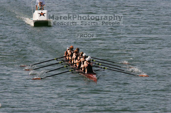 The Texas Rowing first varsity eight team, with coxswain Mary Cait McPherson, stroke Jen VanderMaarel, Felicia Izaguirre-Werner, Meg George, Nancy Arrington, Jelena Zunic, Karli Sheahan, Colleen Irby and Sara Cottingham, finished with a time of 7:09.3, losing to Wisconsin, which completed the race in 7:01.1. This was the third session of the Longhorn Invitational, Saturday afternoon, March 21, 2009 on Lady Bird Lake.

Filename: SRM_20090321_16352194.jpg
Aperture: f/8.0
Shutter Speed: 1/1600
Body: Canon EOS-1D Mark II
Lens: Canon EF 300mm f/2.8 L IS