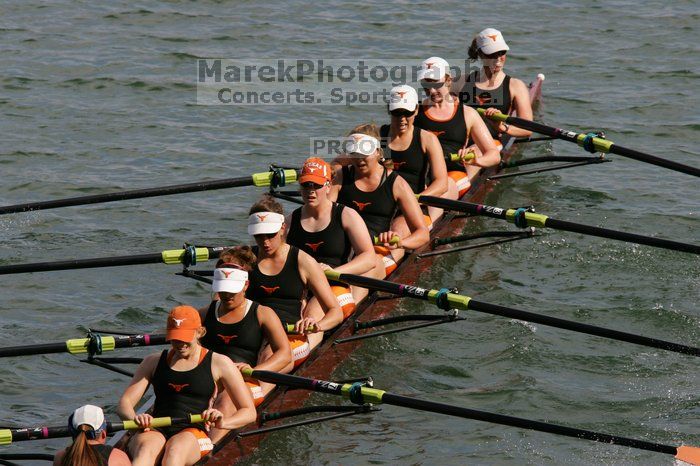 The Texas Rowing first varsity eight team, with coxswain Mary Cait McPherson, stroke Jen VanderMaarel, Felicia Izaguirre-Werner, Meg George, Nancy Arrington, Jelena Zunic, Karli Sheahan, Colleen Irby and Sara Cottingham, finished with a time of 7:09.3, losing to Wisconsin, which completed the race in 7:01.1. This was the third session of the Longhorn Invitational, Saturday afternoon, March 21, 2009 on Lady Bird Lake.

Filename: SRM_20090321_16360038.jpg
Aperture: f/8.0
Shutter Speed: 1/1250
Body: Canon EOS-1D Mark II
Lens: Canon EF 300mm f/2.8 L IS