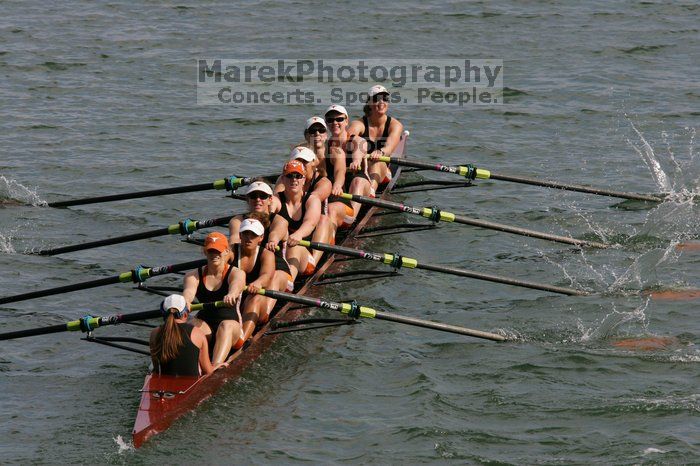 The Texas Rowing first varsity eight team, with coxswain Mary Cait McPherson, stroke Jen VanderMaarel, Felicia Izaguirre-Werner, Meg George, Nancy Arrington, Jelena Zunic, Karli Sheahan, Colleen Irby and Sara Cottingham, finished with a time of 7:09.3, losing to Wisconsin, which completed the race in 7:01.1. This was the third session of the Longhorn Invitational, Saturday afternoon, March 21, 2009 on Lady Bird Lake.

Filename: SRM_20090321_16360440.jpg
Aperture: f/8.0
Shutter Speed: 1/1600
Body: Canon EOS-1D Mark II
Lens: Canon EF 300mm f/2.8 L IS